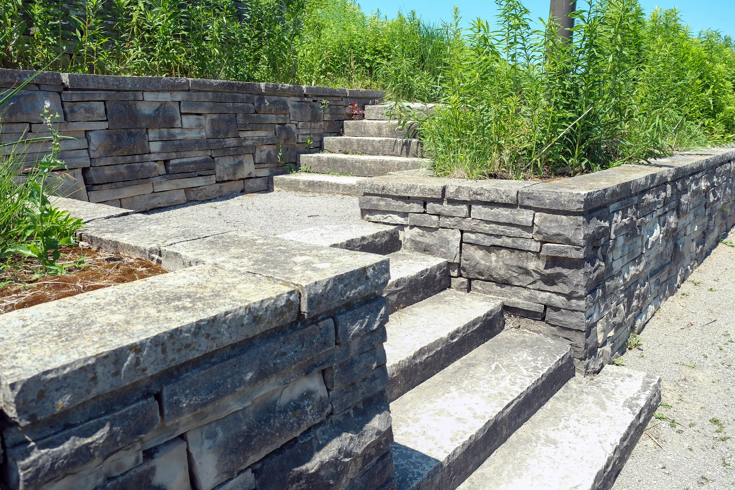 Georgia Luxe Outdoors premium stackstone features and custom flagstone patio installation for a luxury estate in Atlanta.